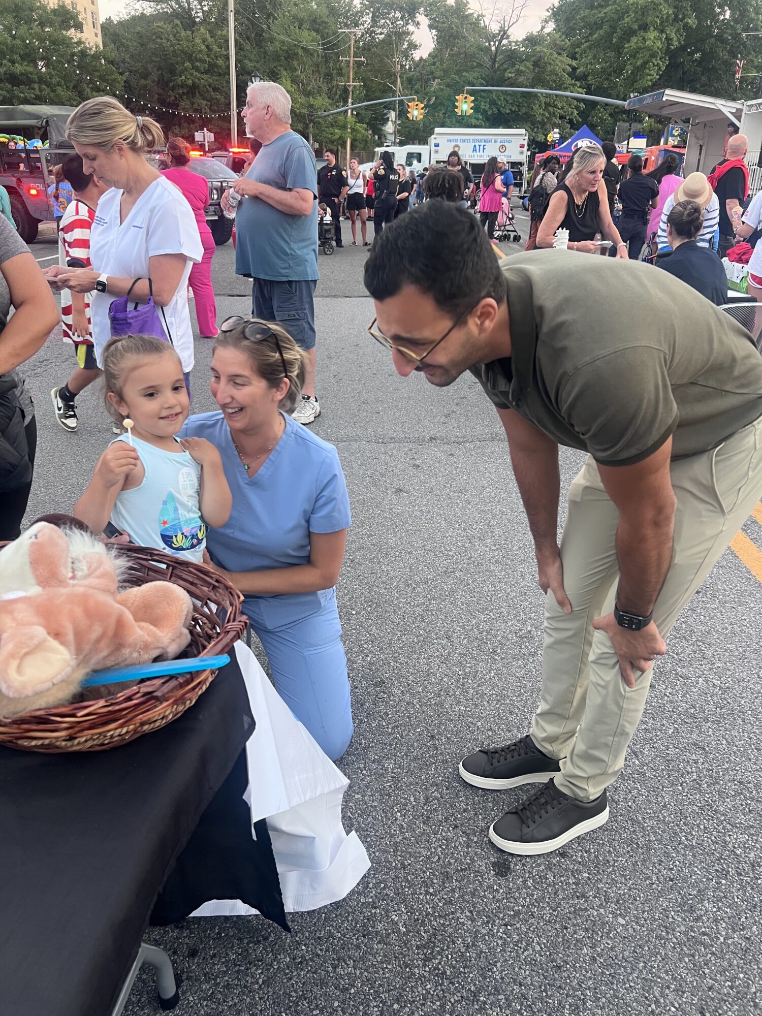 Dr. Zar, Connie and a child patient at Glen Cove's National Night Out